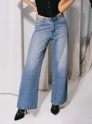 Elegant Minimalist Outdoor Adventure Laser Cut Edges Azula Mid Rise Wide Leg Denim Jean Mid Blue