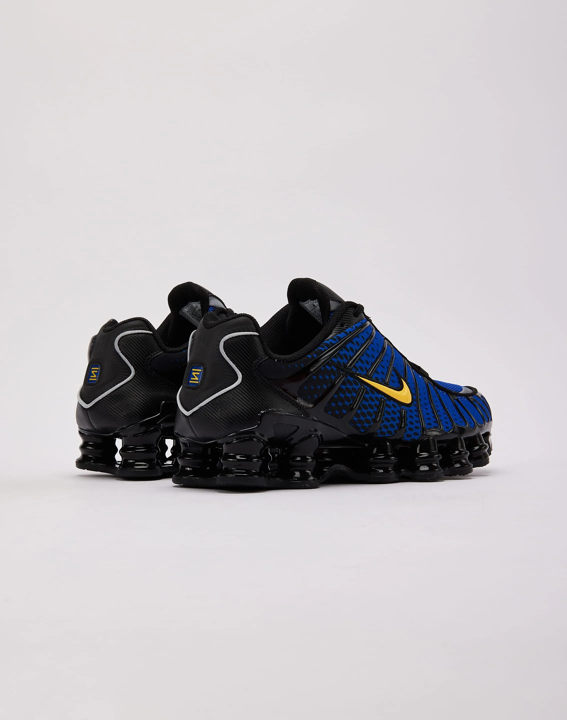 running in a pedestrian path area shoes Nike  Shox TL