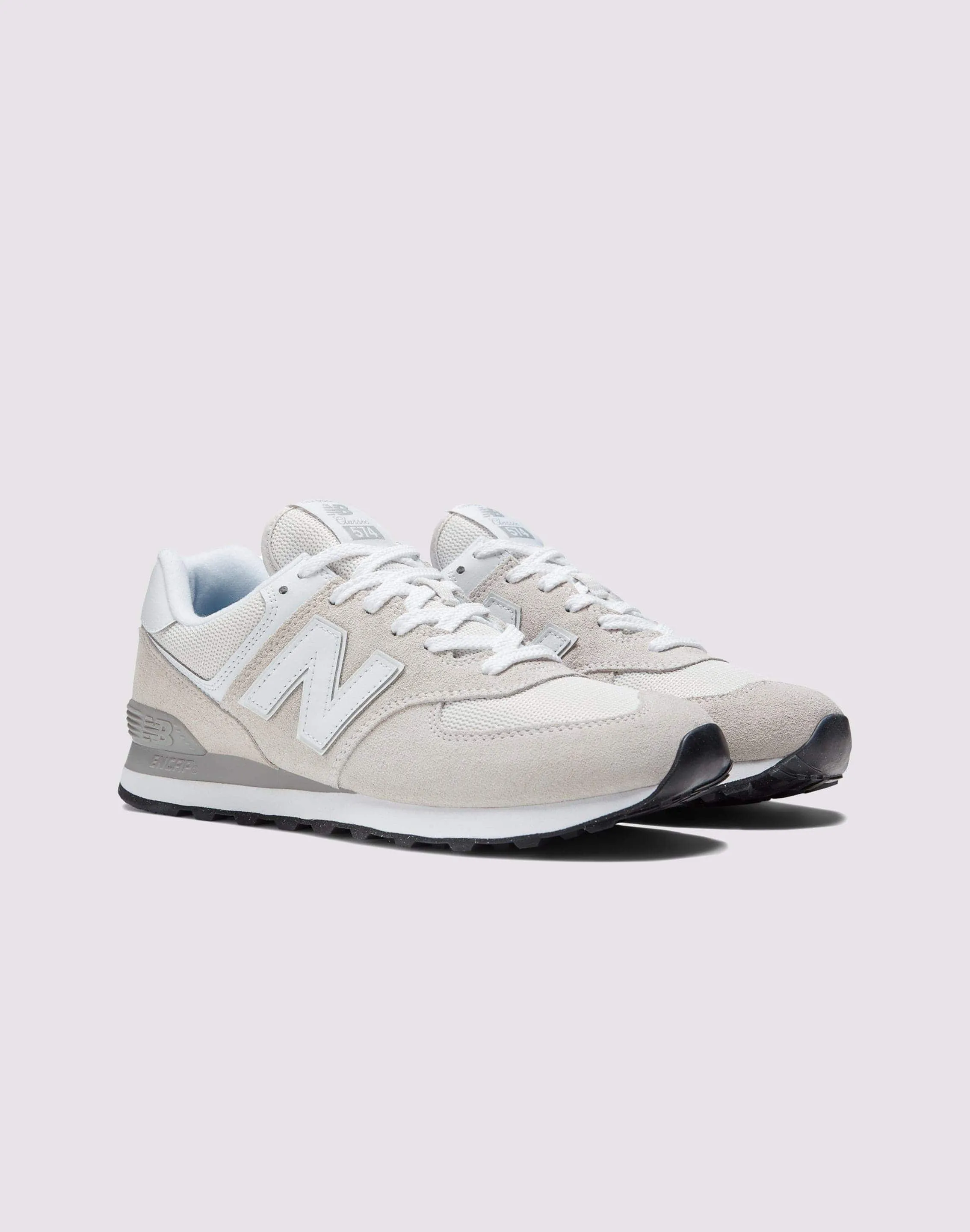 New Balance 574 "Nimbus Cloud/Grey/White" running in a sinter terrace area shoes athlete - endorsed