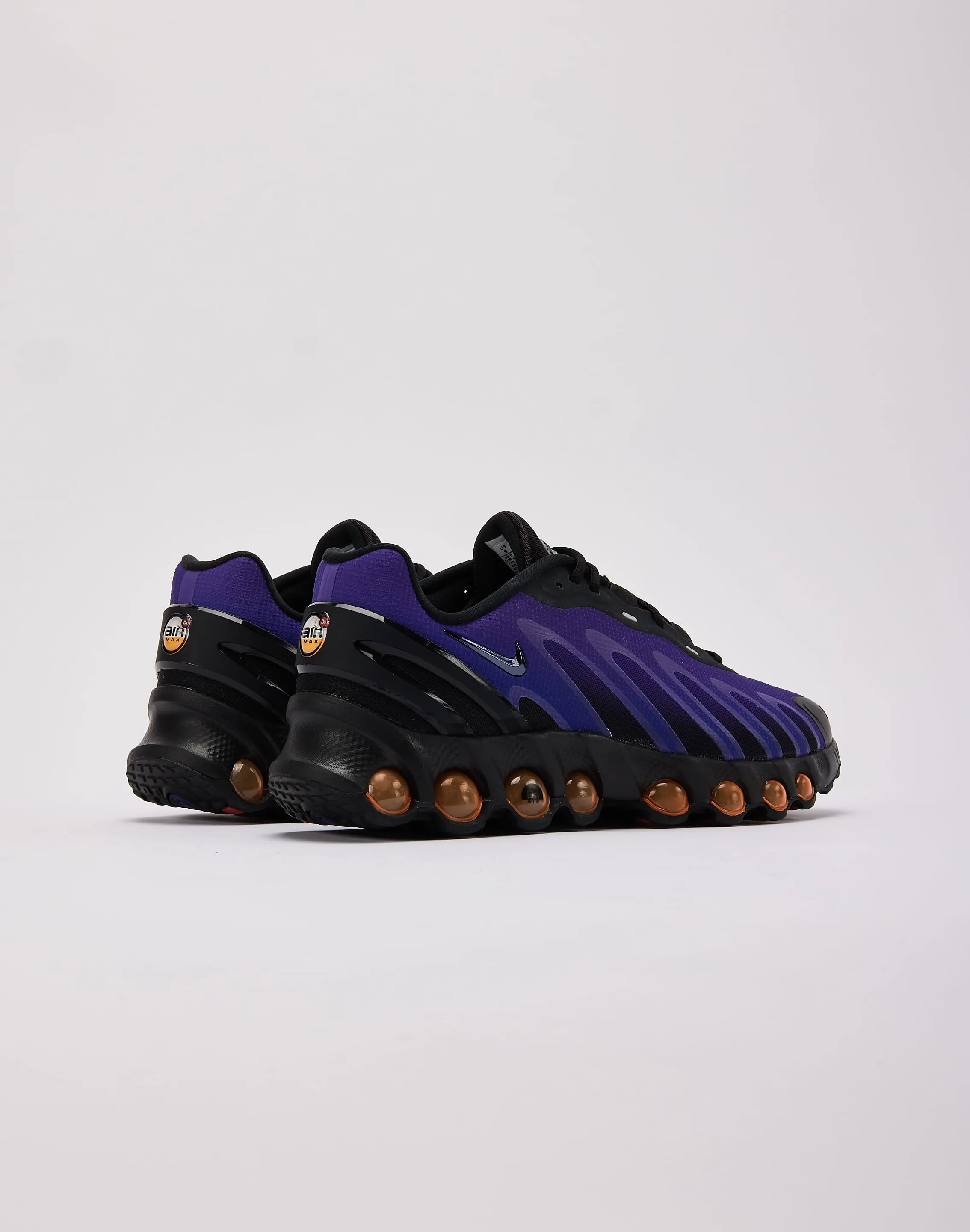 casual wearers running in a golf course area shoes Nike Air Max Dn8