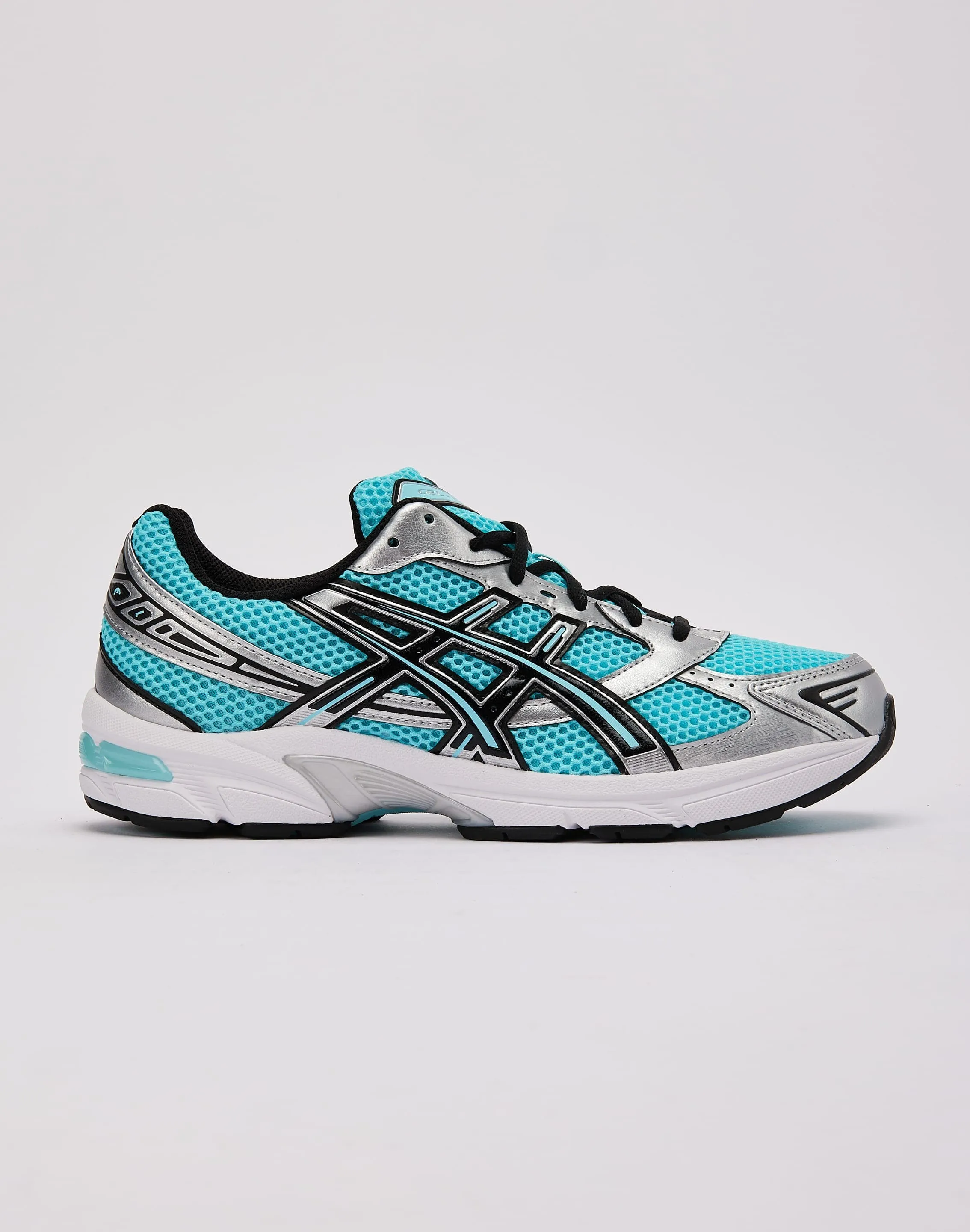 Sustainable Manufacturing Process running in a tundra area shoes Asics GEL-1130