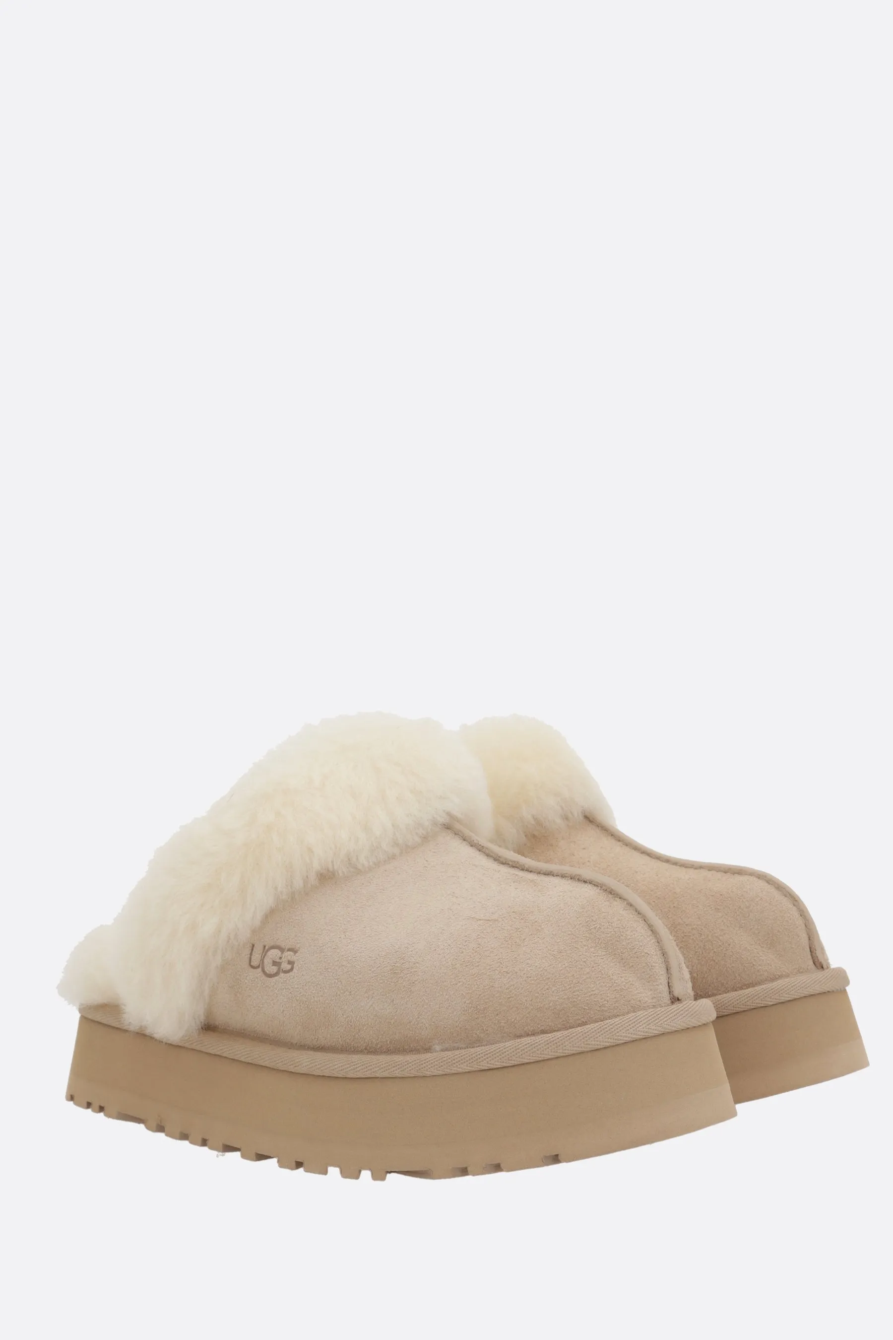 Grippy Sole Energy Returning Sole Disquette flatform slippers in suede